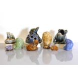 A collection of eight Doulton Lambeth and Royal Doulton stoneware animals,