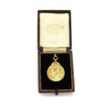 A 9ct gold medal