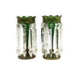 A pair of Victorian green glass table lustres,