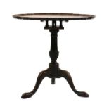 A George III mahogany 'birdcage' tripod table