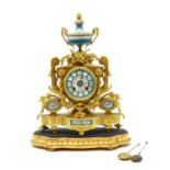 A gilt bronze table clock,