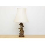 A gilt metal cherub table lamp