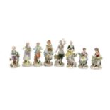 A group of six Sitzendorf porcelain figures,
