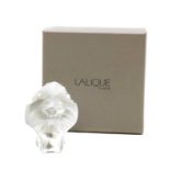 A Lalique 'Tete de Lion' glass paperweight