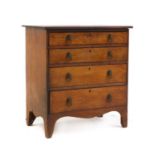 A small George III mahogany chest of drawers,