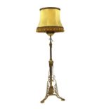 A brass standard lamp,