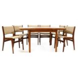 A teak dining suite