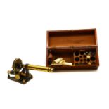 A cased Victorian brass microscope,