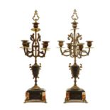 A pair of French gilt-brass and onyx candelabra,