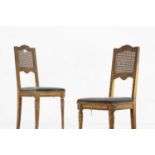 A pair of Louis XVI-style giltwood side chairs,