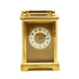 A brass carriage clock,