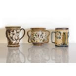 Three Doulton Lambeth stoneware loving cups,
