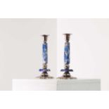 A pair of silvered-metal and lapis lazuli candlesticks,