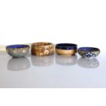 Four Royal Doulton stoneware bowls,