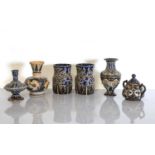 A pair of Doulton Lambeth stoneware vases, three vases and a sucrier and cover,
