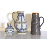 Three Doulton Lambeth stoneware jugs,