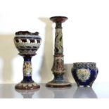 Two Doulton Lambeth stoneware jardinières and stands,