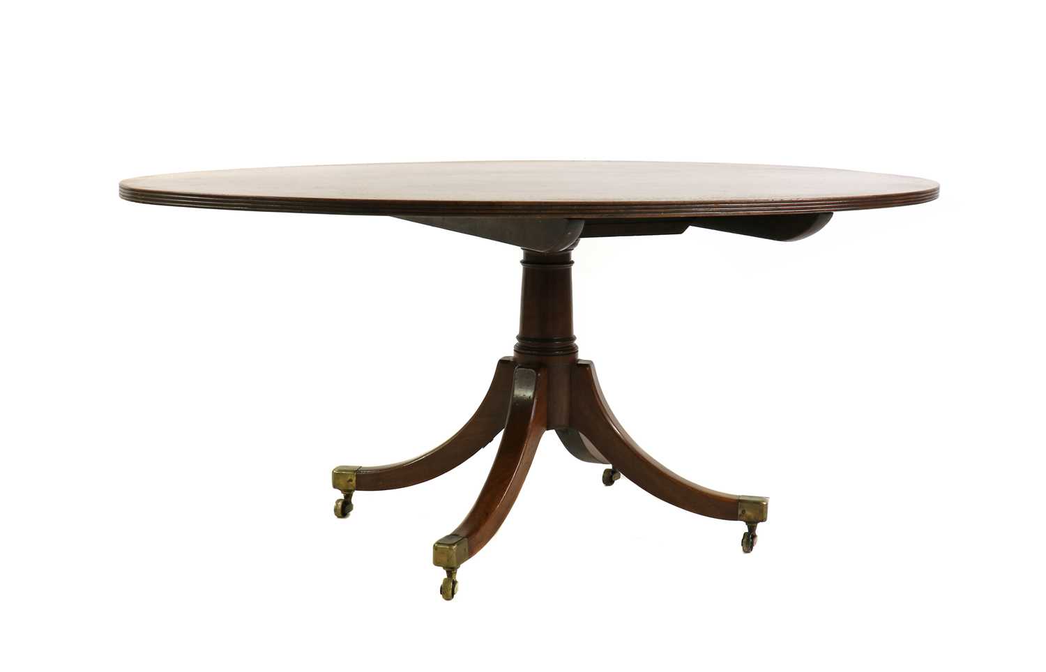 A George III mahogany oval dining table