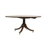 A George III mahogany oval dining table