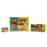 A collection of boxed Corgi and Matchbox toy cars,