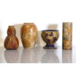 Four Royal Doulton 'Foliage ware' stoneware vases and a jardinière,