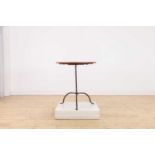 An oak and wrought-iron table,