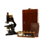 A cased Watson & Sons 'Service' microscope,