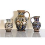 Three Doulton Lambeth stoneware jugs,