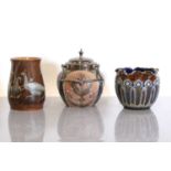Three Doulton Lambeth and Royal Doulton stoneware items,