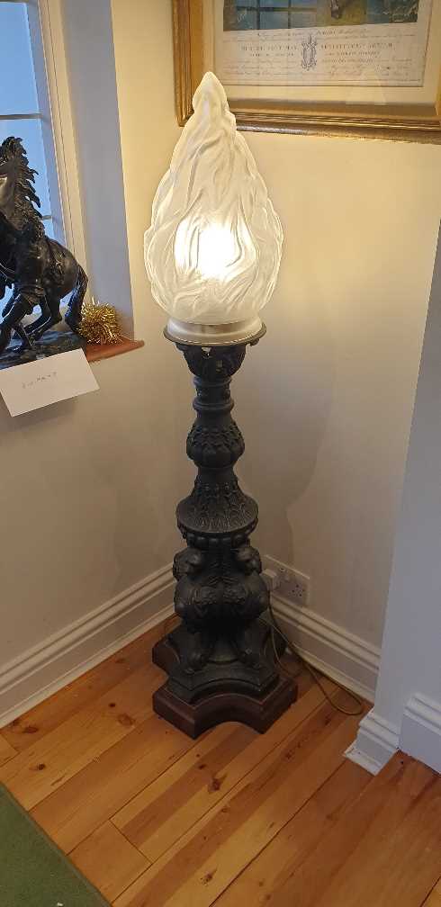 A patinated metal floor lamp with flame shade - Image 6 of 15