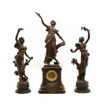 A spelter clock garniture,