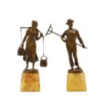 A pair of German bronze figurines,
