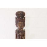 A polychrome painted carved wood figure,