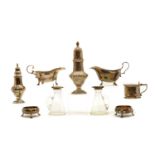 A collection of silver cruet items