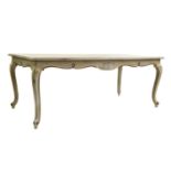 A Louis XV-style painted wooden dining table,