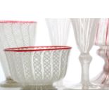 A collection of Zanfirico glass items