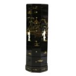 A black lacquered Chinoiserie octagonal bank of drawers