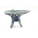 A Chinese blue and white jue cup,