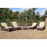 A set of four Bridgman Marlow sunbeds and side table