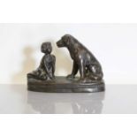 A bronze of a girl and a dog,