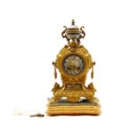 A French gilt metal and porcelain mantel clock,