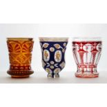 A group of Bohemian glass beakers,