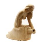 A cream glazed stoneware fountain,