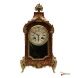A Boulle work and ebonised mantel clock