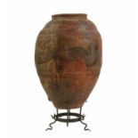 A large painted terracotta oil pot