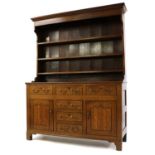 A late George III oak dresser