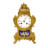A gilt bronze and porcelain mantel clock,