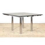 An 'Andre' dining table,