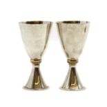 A pair of limited edition silver wedding cups