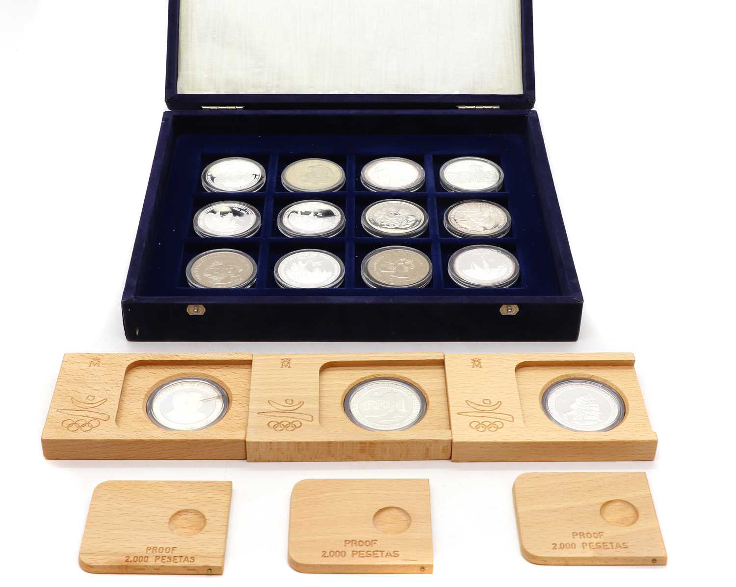 A set of twelve silver commemorative coins